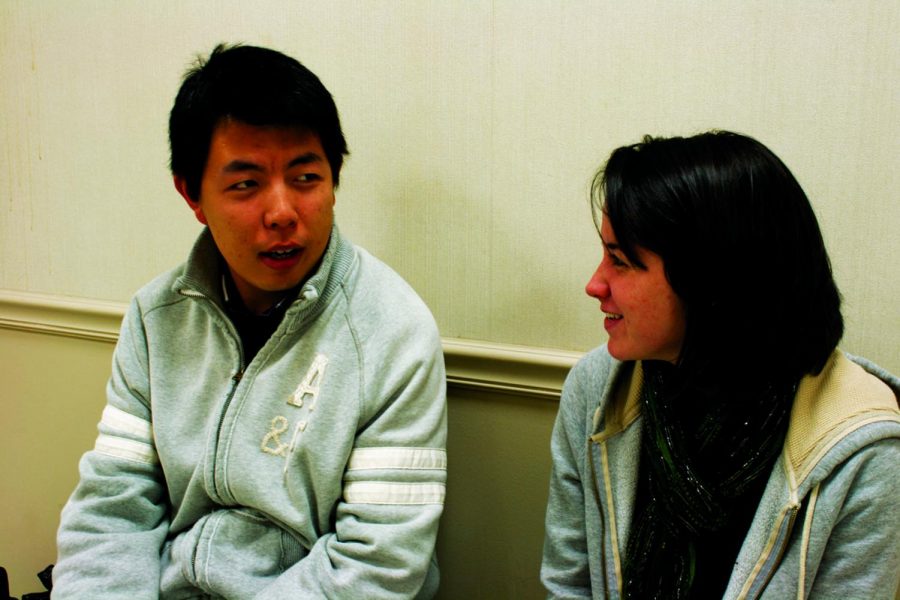 UNA student Kaylie Watts (right) meets with her language partner
Chenran Wang (left) and teaches him the English language.

