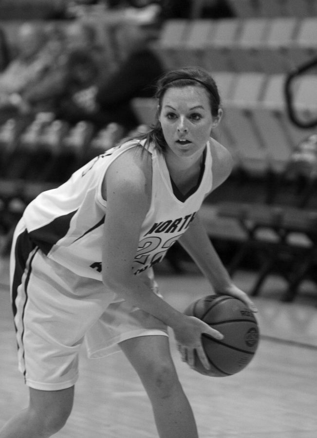 SOMEONE GET OPEN — Lions junior guard Jessi Smith looks for an open teammate to pass the ball to. The Lions made a comeback after giving up the lead in the second half to win their fourth Gulf South Conference game this season.