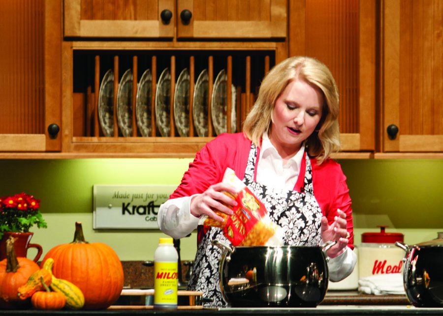 OVERNIGHT SUCCESS— UNA graduate and North Alabama resident Christy Jordan shows her kitchen skills in a cooking demo this past October. Jordan was on campus to promote her first cookbook she titled after her popular blog, “Southern Plate.”