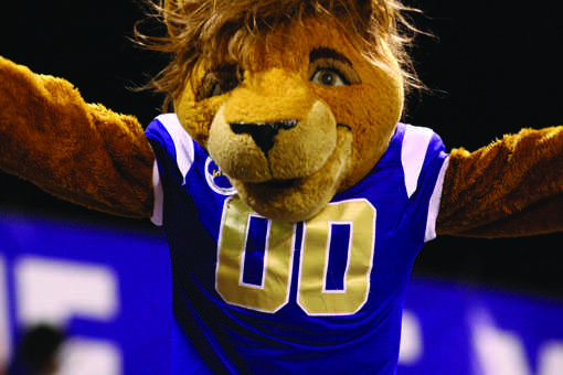 MY+TIME+TO+SHINE+-+Leo+runs+out+in+front+of+the+crowd+during+a+game+at+Braly+Stadium+this+season.+The+life+of+a+mascot+is+hard+work%2C+but+Leo+and+Una+seem+to+enjoy+it+and+work+hard+every+game.