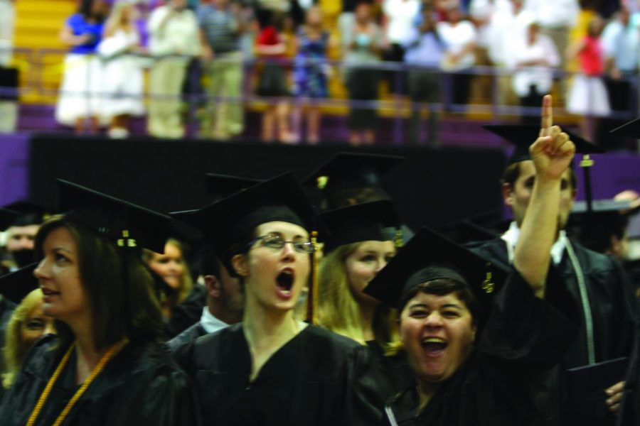 UNA graduates from 2010 celebrate with excitement as they obtain their college degrees. Latest research finds women more likely to graduate with a bachelors degree by the age of 23.