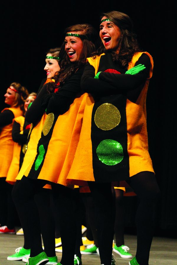 Two Alpha Gamma Deltas pose during a routine. The sisters of
Alpha Gamma Delta won first place in the womens division in
2011.
