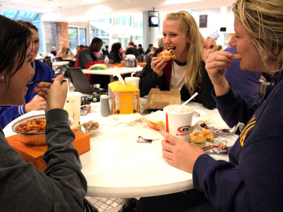 Students fill the GUC at lunch to eat a variety of foods offered. New research indicates that eating food can become an addiction, much like a drug addiction.