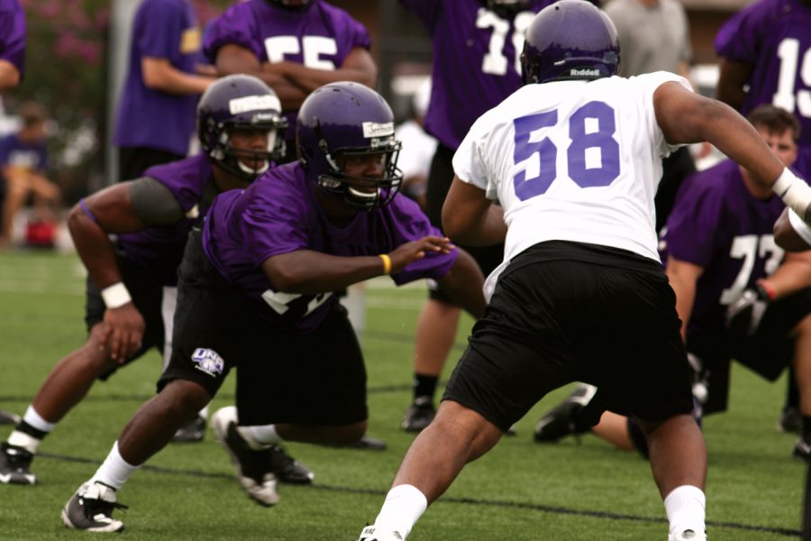 UNA football players practice for the upcoming season.
