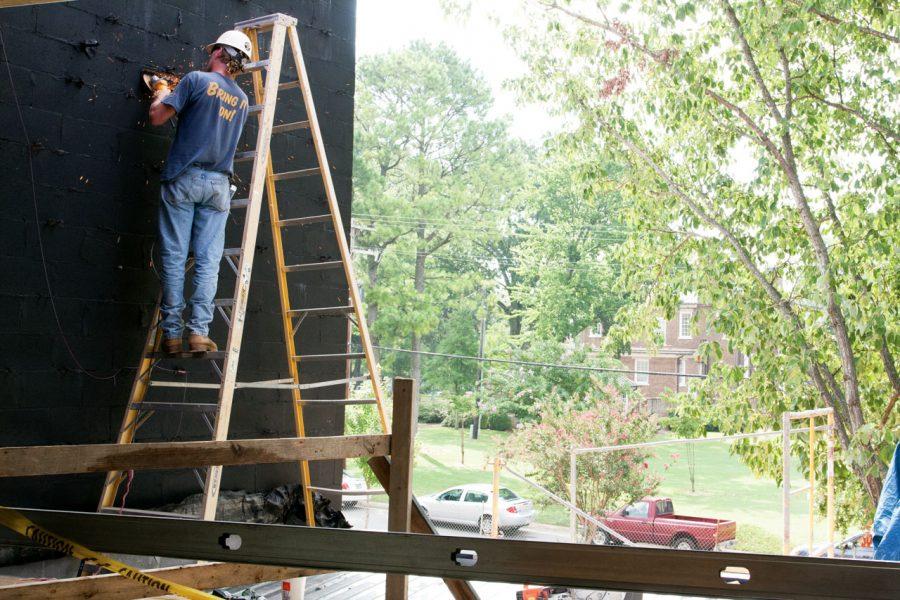 Construction workers work on UNA’s black box theater.
Construction on the theater is expected to be complete by early
2012. The theater will be home to the many student-directed plays
and smaller productions the Department of Music and Theater puts on
each year.
