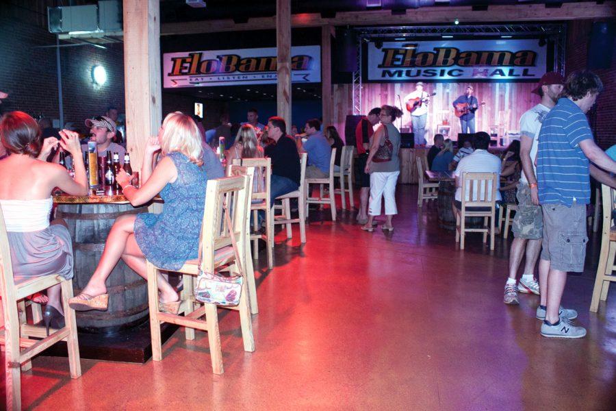 Patrons enjoy one of Florence’s new nightspots. Flo-Bama, a
restaurant and bar, is located in downtown Florence on Court Street
and opened late this summer.
