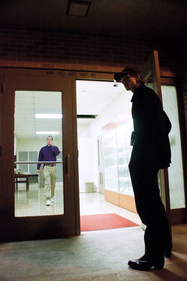 Members of the Student Nighttime Auxiliary Patrol check
buildings for security as well as transport students on campus.
