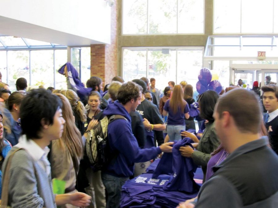 Students line up to get free T-shirts from the University
Program Council Oct. 31. UPC handed out shirts to the first 400
students who entered the GUC atrium at 11 a.m.
