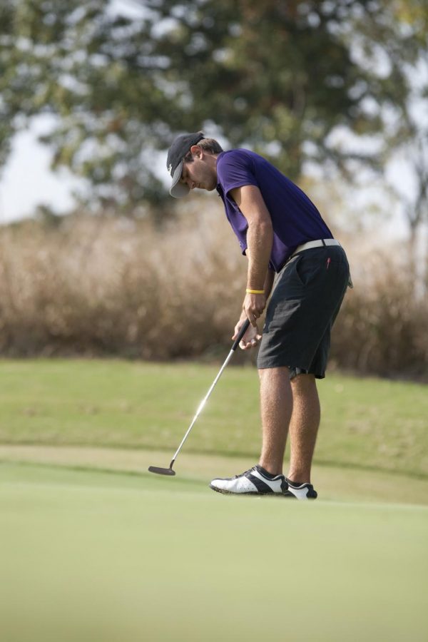 Ty Chandler makes a putt during a golf tournament earlier this year. Chandler’s game has helped raise UNA golf to a national power.
