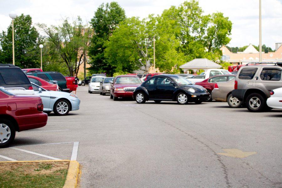 Students search for parking in the GUC parking lot on Pine Street. Some students resort to shuttle buses or off-campus parking to remedy their parking difficulties. 
