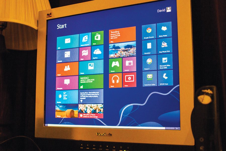The new Windows 8 screen features tiles similiar to Windows smartphones. 
