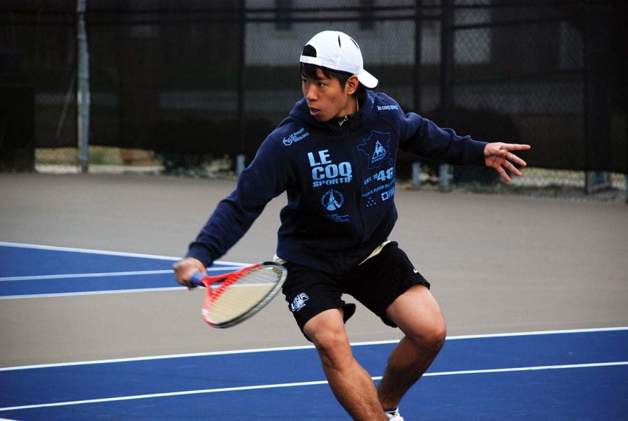 Hisato Wakaizumi works out during preseason practice on Jan. 27 at the UNA Tennis fields.
