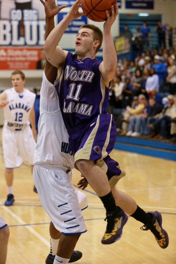 Sophomore guard Nathan Spehr makes a leap for the basket in the Jan. 19 game at UA-Huntsville.

