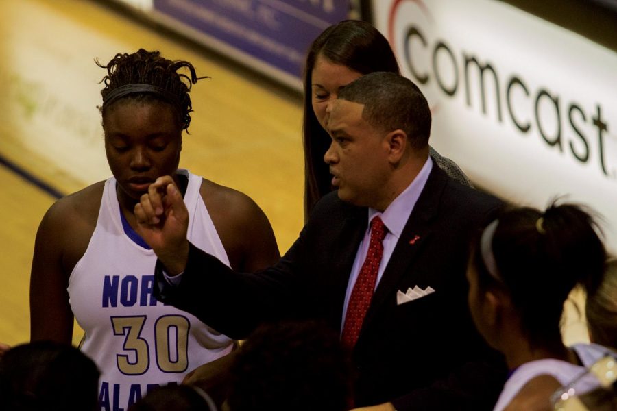 UNA women’s head basketball coach Terry Fowler discusses a play with players during a game earlier this year against Christian Brothers University in Flowers Hall.
