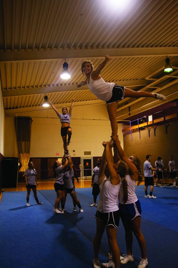 The Purple and White Squad of the Competitive Cheer Team practices in Flowers Hall on Tuesday August 27, 2013.