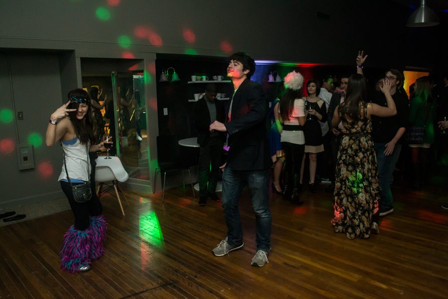 Leilani Dimeler, a student, and other party goers attend Society Florence’s first event, titled “The Society,” on March 1 at Indie Spaces in Downtown Florence. 