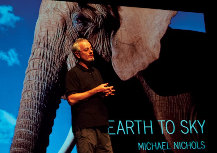 Alumnus Michael “Nick” Nichols presented his book “Earth to Sky” at Norton Auditorium on Friday, Oct. 18. Nichols’ presentation also described the details in his exhibit “The Short, Happy Life of a Serengeti Lion,” now open at Court Street Market.