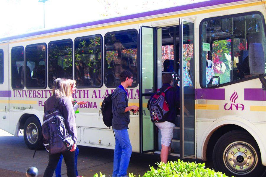 Students board a campus shuttle bus during school hours. Although students can currently track the location of five of the buses through the UNA App, officials are looking to purchase an additional five location devices, said UNA Police Chief Bob Pastula.