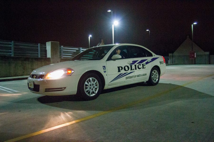 Sergeant Les Jackson patrols the parking deck on the UNA campus. Campus police are available to assist with student car trouble, said Chief Pastula.