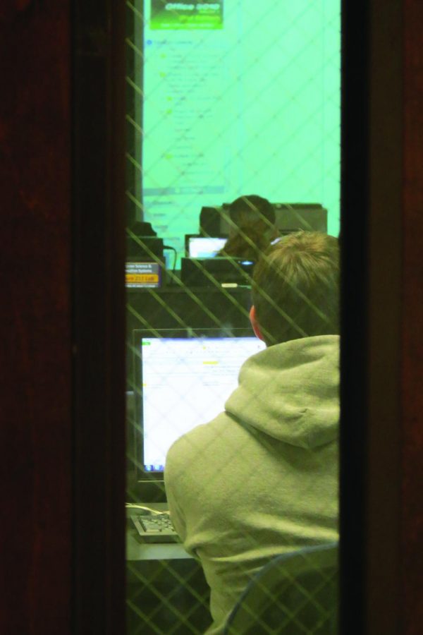 Students work in a computer lab during a computer information systems course. Three computer science minors have been approved for next semester.