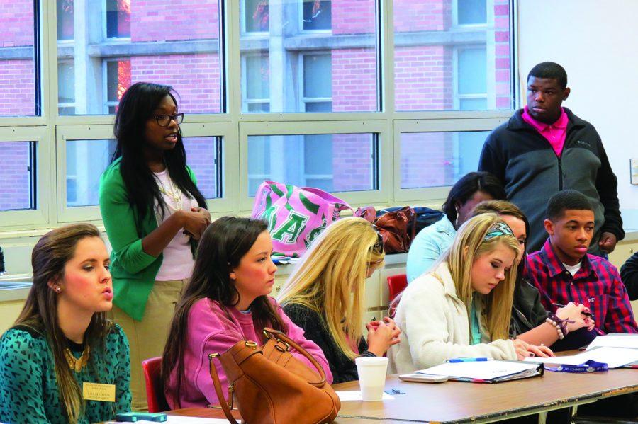 Freshman Forum Adviser Brittany Jordan presents new information during their meeting held on Jan. 15. The forum has 216 service hours left to meet their goal of 1,830 hours for the school year, said Service Chairwoman Erica  Blackstock.    