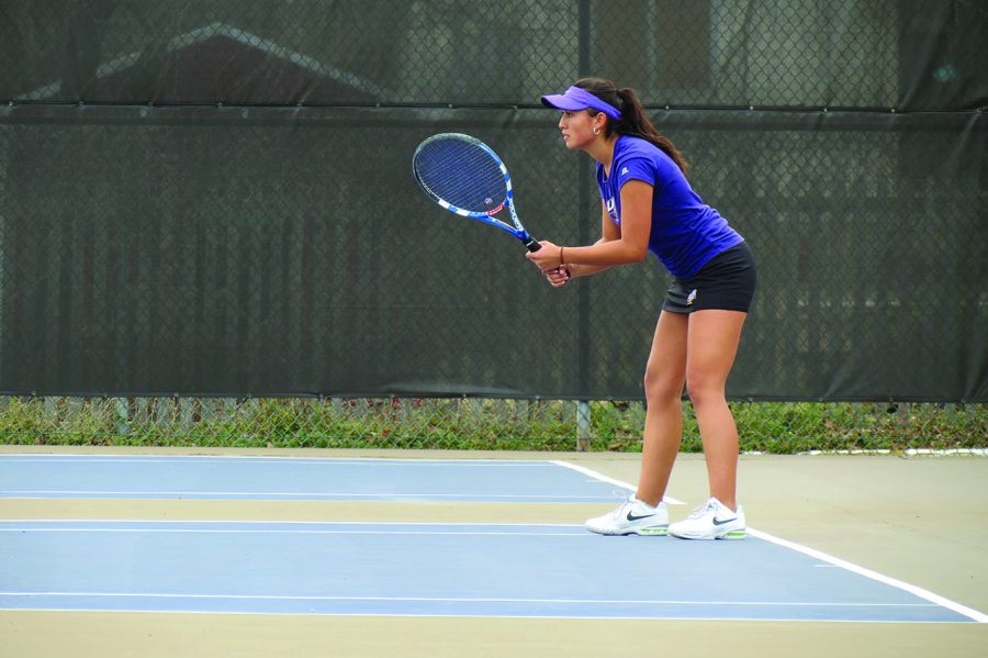 Natalia Barragan waits for the serve from her opponent at the match against West Georgia.