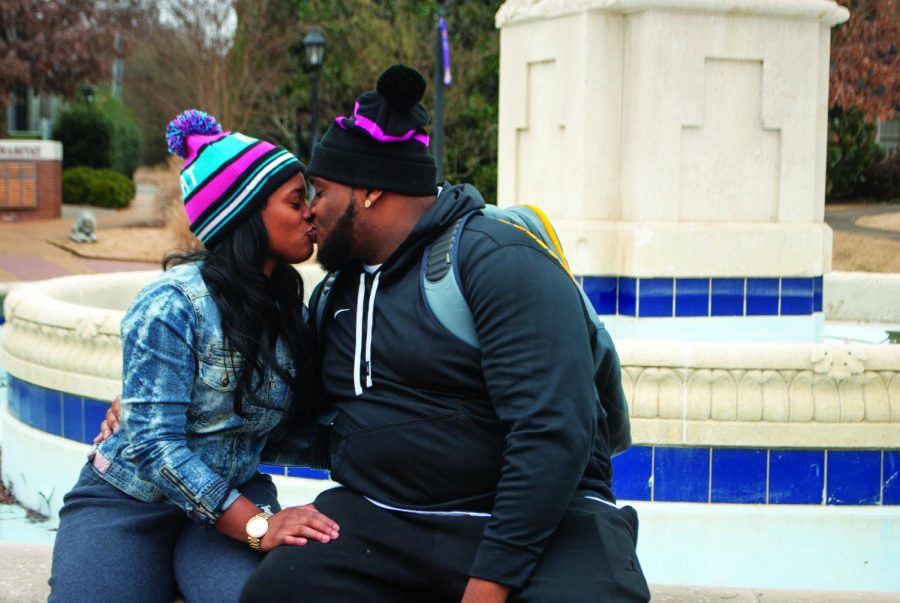 Day’Zha Sales and Haston Coates share a kiss on campus. Relationship length is not determined by whether or not someone is in college, officials said.