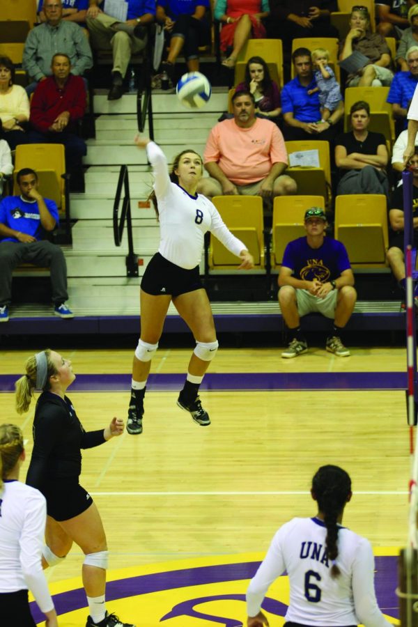 Sophomore hitter Natasha Fomina attempts to spike the ball against Shorter University Sept. 11. Fomina finished with a team best 12 kills.