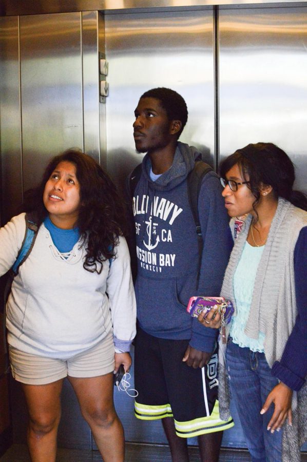 Students Laura Lopez, Kenson St. Remy and Jasmine Spencer prepare to take the elevator to the second floor of the GUC. Campus elevators were not inspected until about one month after their certifications expired.