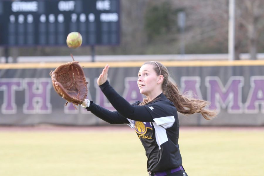 Senior outfielder Ashley Bonner looks a fly ball into her glove during practice Jan. 20. The Lions finished third in the Gulf South Conference in 2014 with a 38-19 (19-11) record. GSC coaches picked UNA to finish fourth in the conference this year. The season opener is Feb. 2 against Truett McConnell College at home.