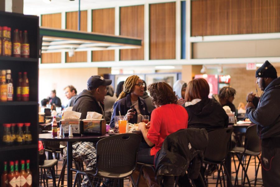 Students eat together in Towers Cafeteria Feb. 7. Sodexo Operations Manager Gwen Burney said to-go boxes were removed from the facility because students were misusing them. She said students can request to be added to a list to receive meals in to-go boxes.