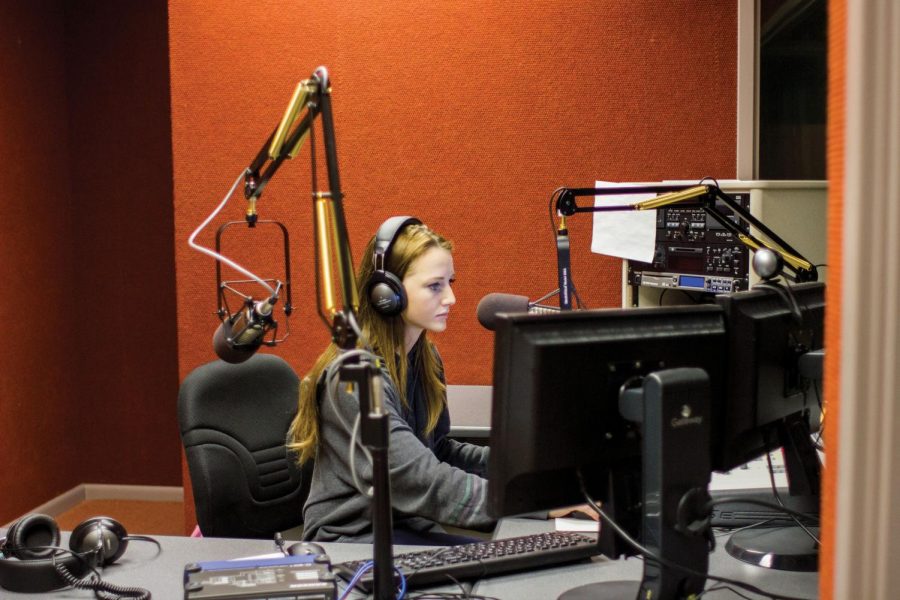 Student Tera Broaddrick utilizes the Communications Building studio to finish a class project. Chair of the Department of Communications Greg Pitts said students will soon be getting real world experience in the Communications Building when WLNP radio hits the airwaves on FM 107.9 this summer.