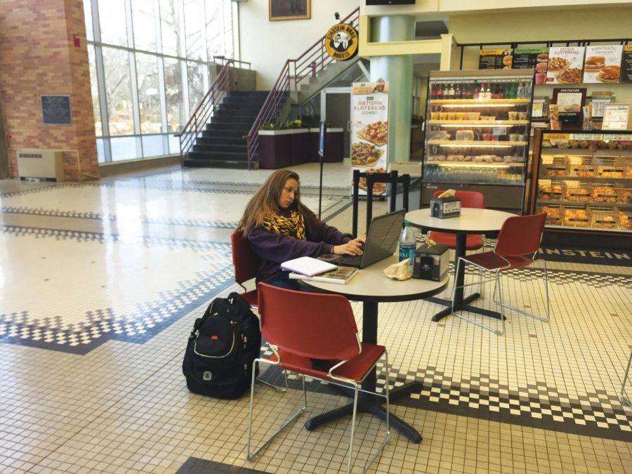 Sophomore Victoria Roose sits at a table in the GUC catching up on homework on her laptop. Roose said she only reads campus emails if the subject line is something that pertains to her.