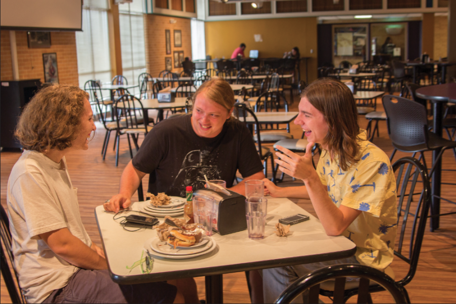 Freshmen Shawn Hicks (left), Nick Wsueul (middle) and Zackary Turner (right) laugh in Towers Café during the extended dining hours. Towers Café is now open from 7 a.m. until 8:30 p.m. Monday through Friday.