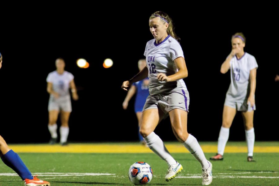 Junior Midfielder Eleanor Costello takes control of the ball as she drives down the field. Costello and the women’s soccer team had a magnificent second half to come back and beat UAH 6-1 Sept 17.