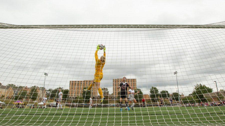 Goalkeeper Shelby Thornton reaches up for a save against Cumberland Sept. 27. The goalkeeper position is one of the most pressured positions in the sport, said UNA head coach Chris Walker.