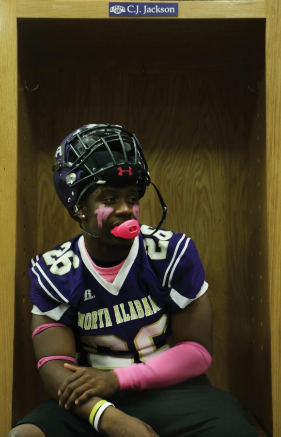 Senior+linebacker+C.J.+Jackson+shows+his+support+for+breast+cancer+awareness+by+wearing+pink+for+the+Oct.+31+game+against+Delta+State.+The+entire+football+team+is+supporting+the+cause.