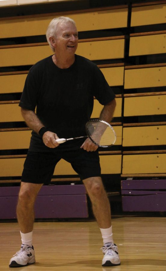 UNA professor Don McBrayer smiles as he enjoys a match of badminton in between classes. McBrayer is 70 years old and still enjoys remaining active daily.
