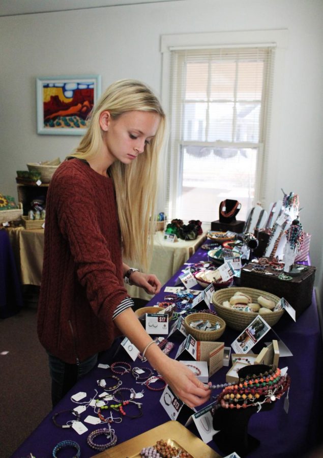 Beads for Life  supports women living in severe poverty stricken areas of Uganda. For the past four years the Womens Center has offered these beautiful handmade pieces of jewelry for sale.  Freshman Karlee Mauk examines the handmade necklaces and earrings.