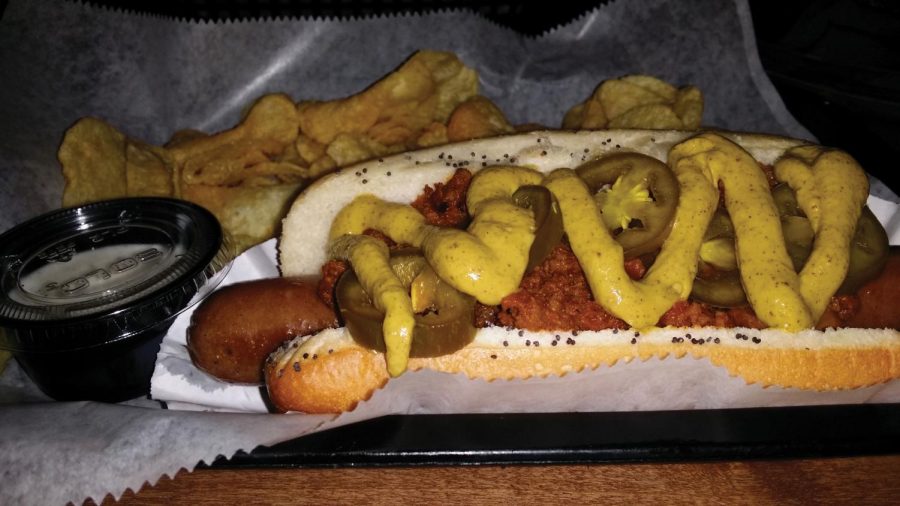 Wildwood Tavern’s “Bomb Squad Dog” explodes with flavor. The restaurant on Mobile Street offers plenty of dining options, including pizza and sandwiches, under $8.99.