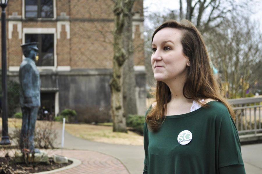 Student+Government+Association+President+Sarah+Green+listens+to+a+student+ask+questions+about+voting+Feb.+23+outside+of+the+Guillot+University+Center.+Green+hopes+to+connect+with+more+students+next+year.