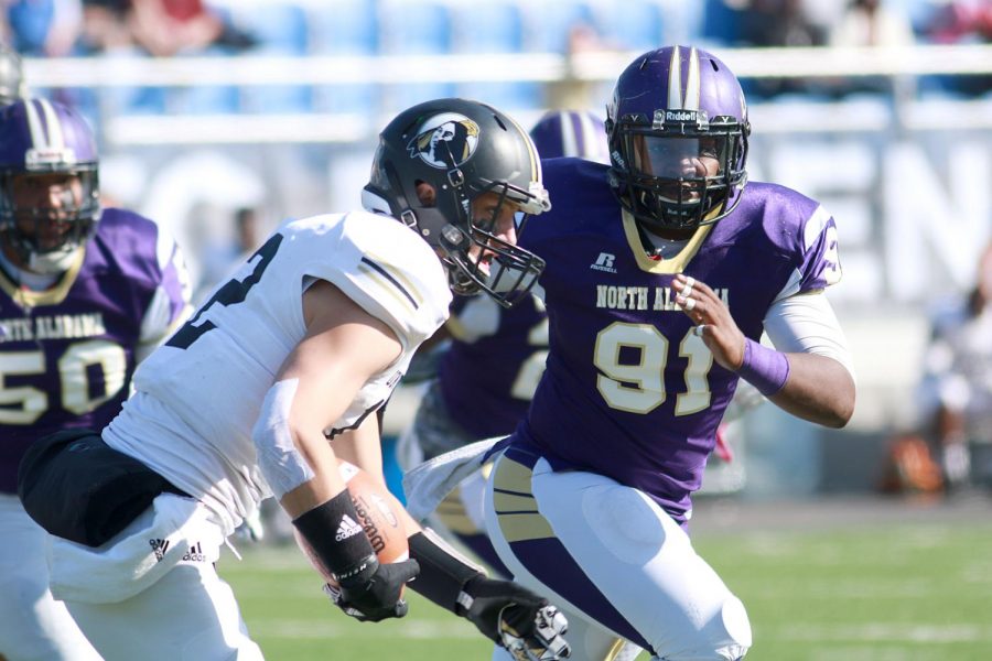 Senior defensive end Tyler Smith chases down a ball carrier against North Carolina-Pembroke Nov. 26 during an NCAA Division II second round playoff game. Smith is one of many upperclassmen on the North Alabama roster heading into the national championship game.
