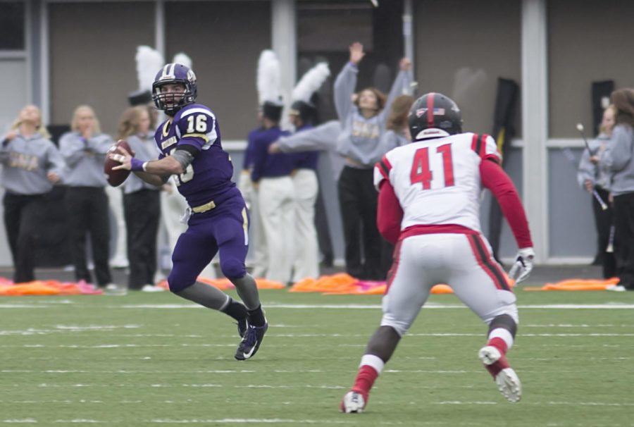Lions Harlon Hill candidate quarterback Jacob Tucker looking for an open receiver as he scrambles outside the pocket during North Alabamas quarterfinal game against North Greenville. With the 38-0 victory over the Crusaders, UNA advances to the semifinals for the first time since 2008.