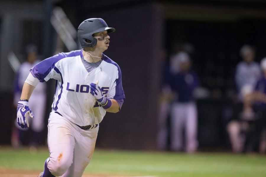 North Alabama junior first baseman Kyle Hubbuch looks on as he hits one of his four home runs this season against Bellarmine Feb. 12 at Mike Lane Field. Hubbuch leads the Lions in hits, runs, RBIs and home runs through 10 games this season.