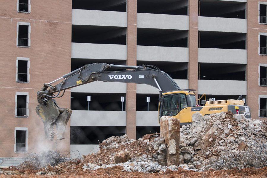 Contractors work to remove rubble from Floyd Hall demolition. The university awarded a contract to B. H. Craig Construction, but the company illegally dumped debris off of three Lauderdale County roads.