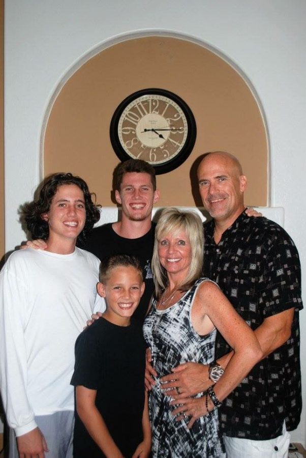 Kevin Haslam with his wife Kathy and three sons (far left) Gehrig, (middle back) Payton and (middle front) Landry. Haslam is expected to be on campus in his new role before June 1.