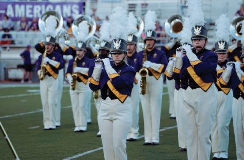 The woodwind section of the UNA band perform for the first time using their new name.