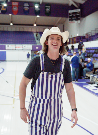 Every cowboy needs purple overalls