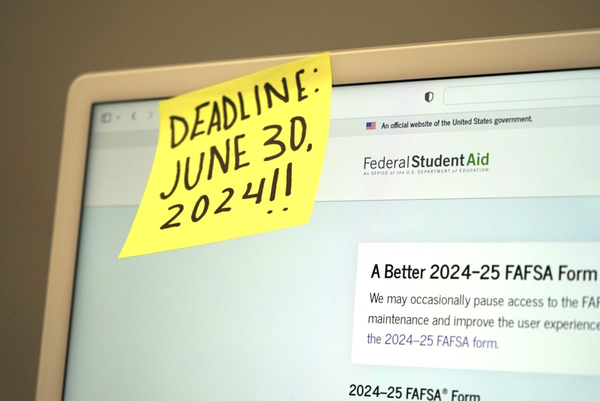 A student works on filling their 2024 FAFSA form.