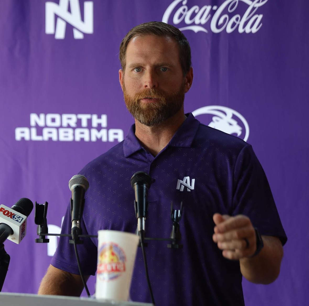 Brent Dearmon spoke to the crowd at the conference. | COURTESY OF UNA ATHLETICS